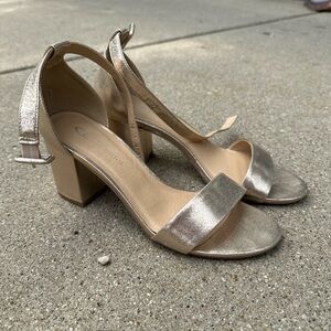 Gold heels, around ankle strap